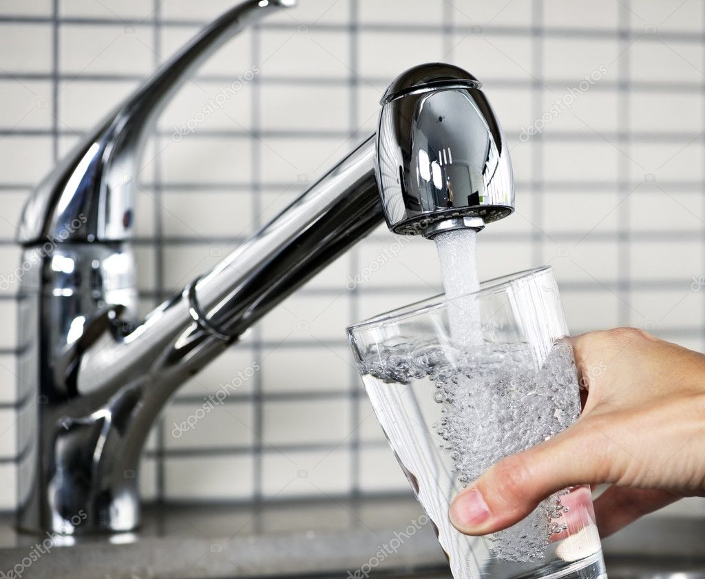 depositphotos 4466883 stock photo filling glass of tap water