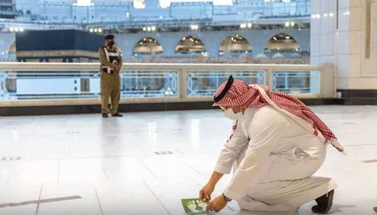 Masjid al haram social distancing stickers removed makkah