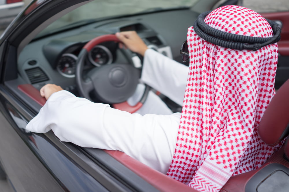 Arab man driving